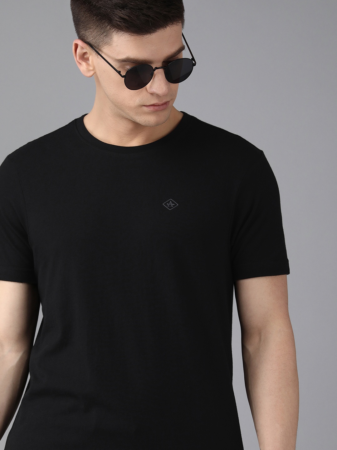 

Arrow Men Black Solid Pure Cotton T-shirt