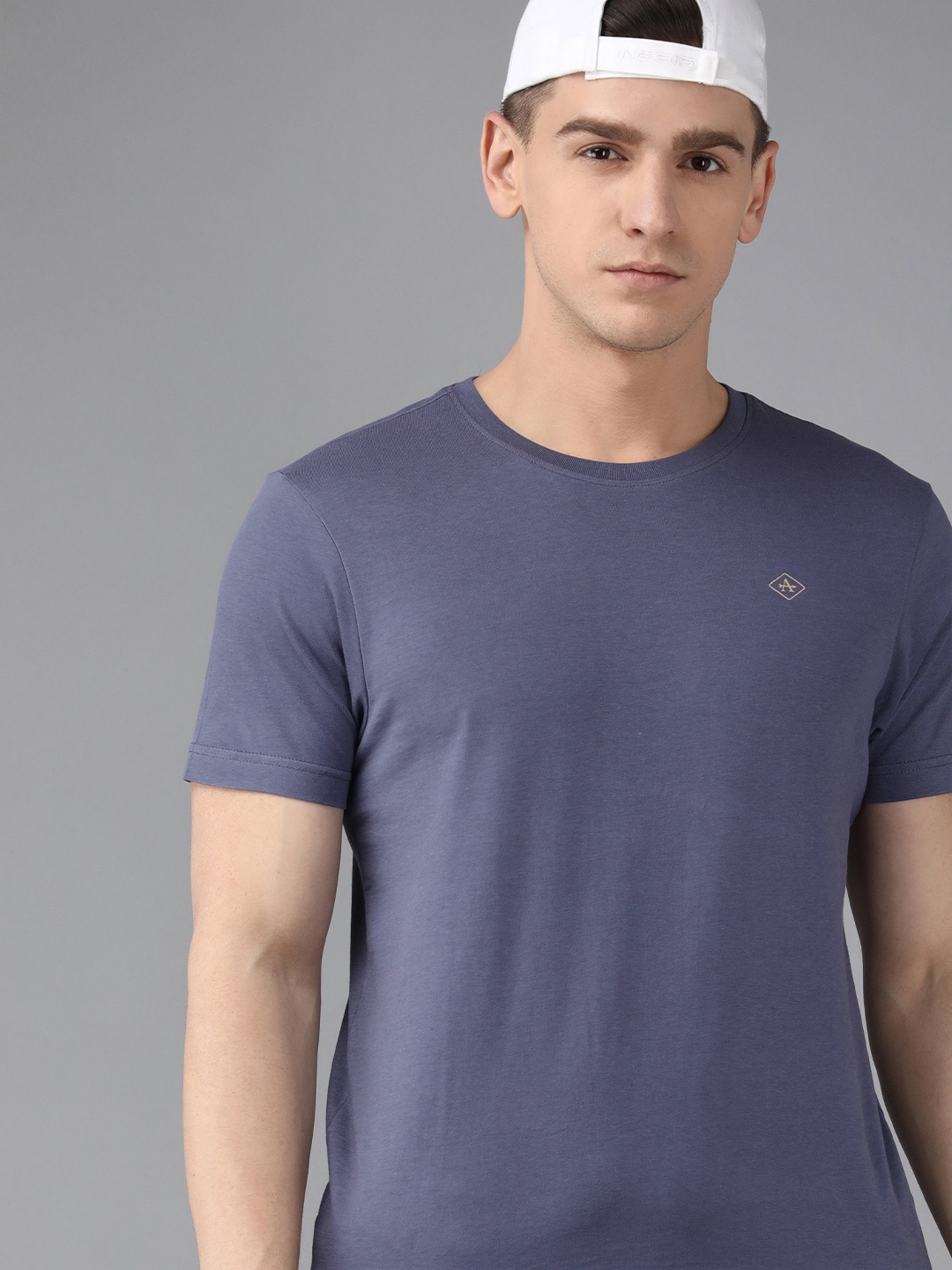 

Arrow Men Blue Solid Slim Fit Pure Cotton Casual T-shirt