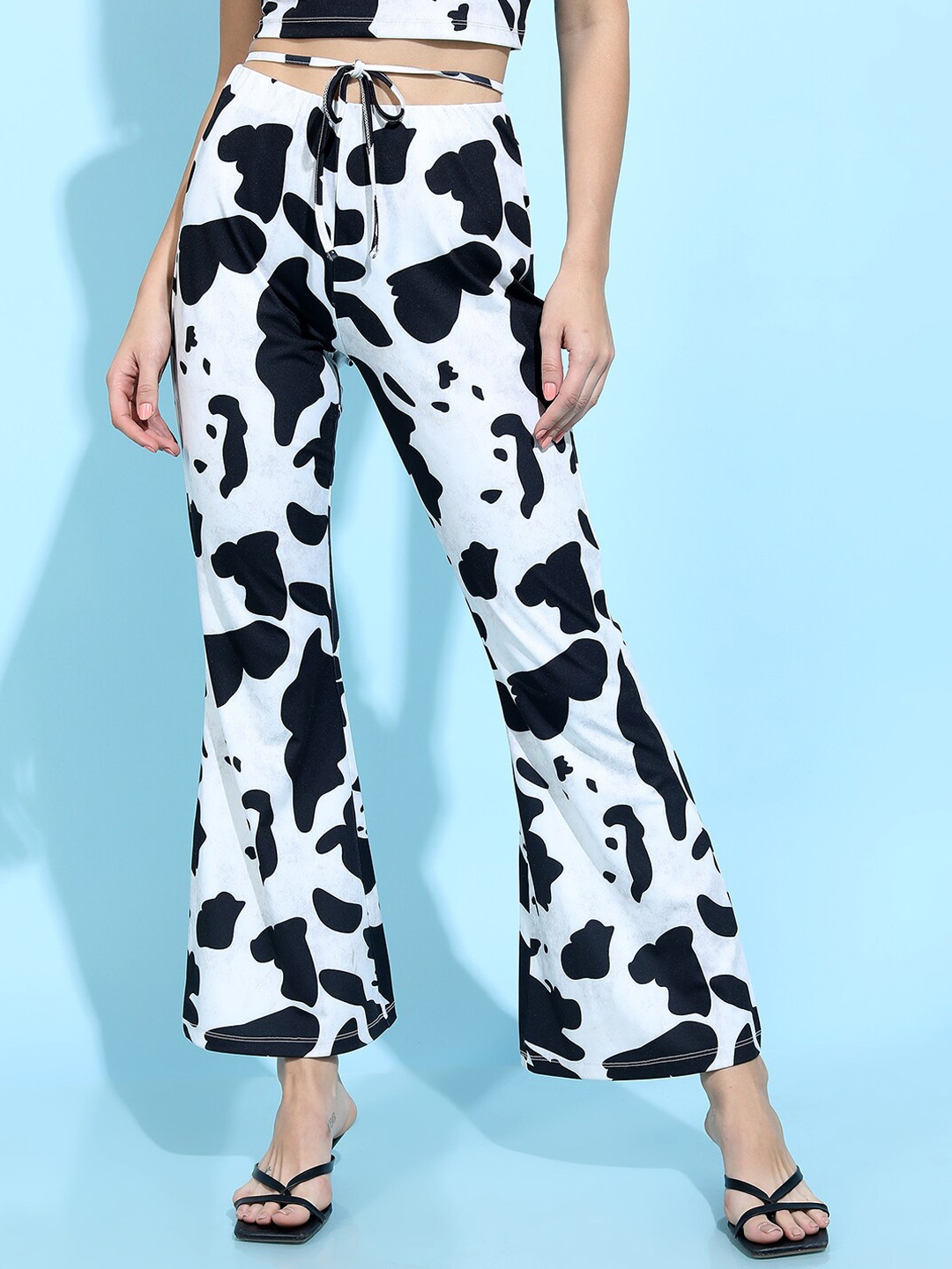 

Tokyo Talkies Women White Animal Printed Flared Trousers