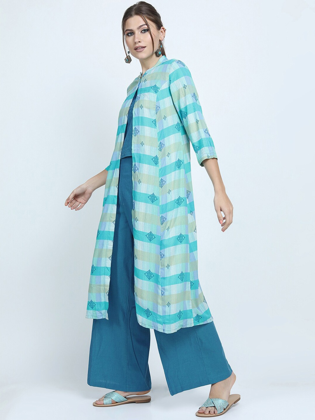 

Vishudh Blue Printed Top With Palazzo & Jacket