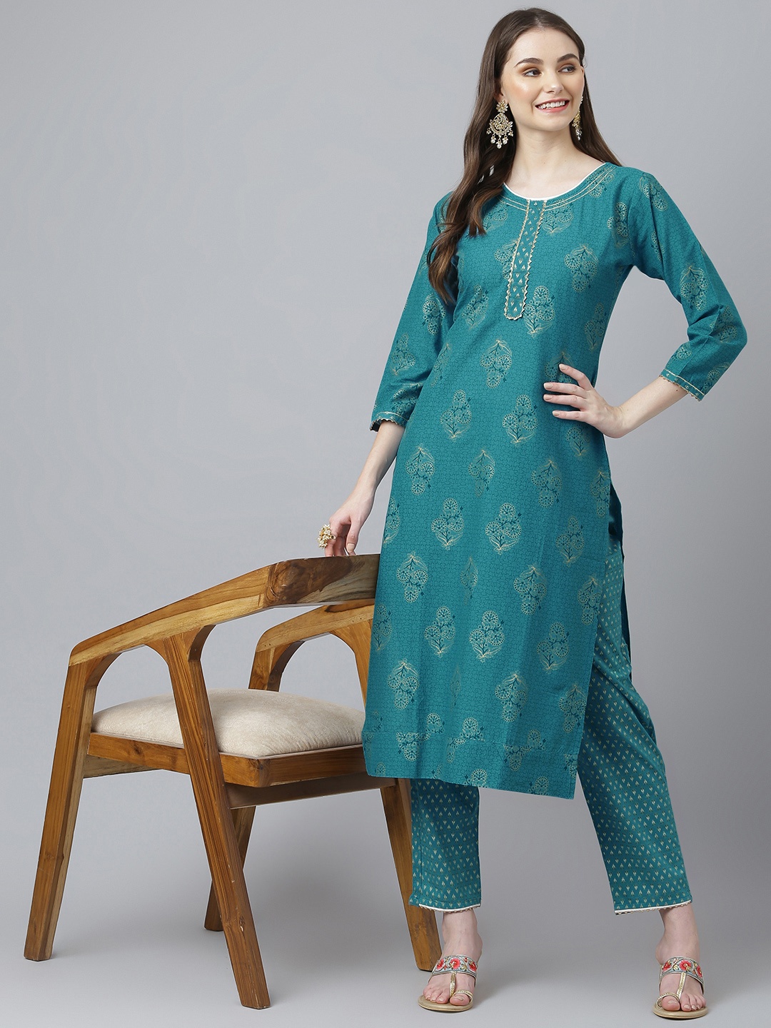 

Kiana House Of Fashion Women Turquoise Blue Ethnic Motifs Printed Pure Cotton Kurta with Trousers Set