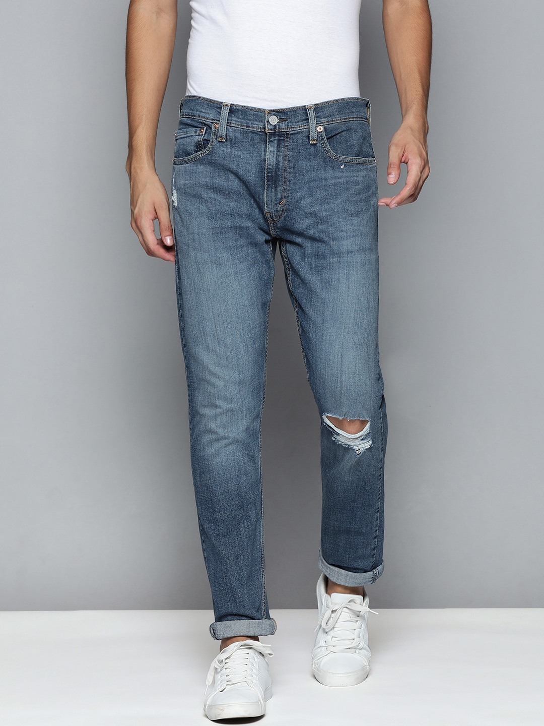

Levis Men Blue Slim Fit Slash Knee Heavy Fade Stretchable Jeans