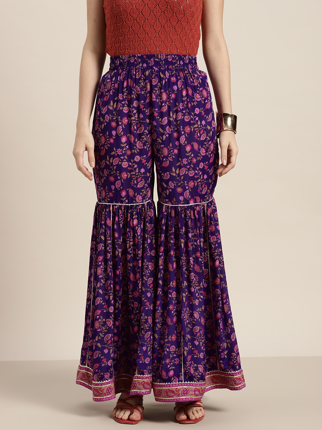 

Shae by SASSAFRAS Women Purple Floral Printed Flared Ethnic Palazzos