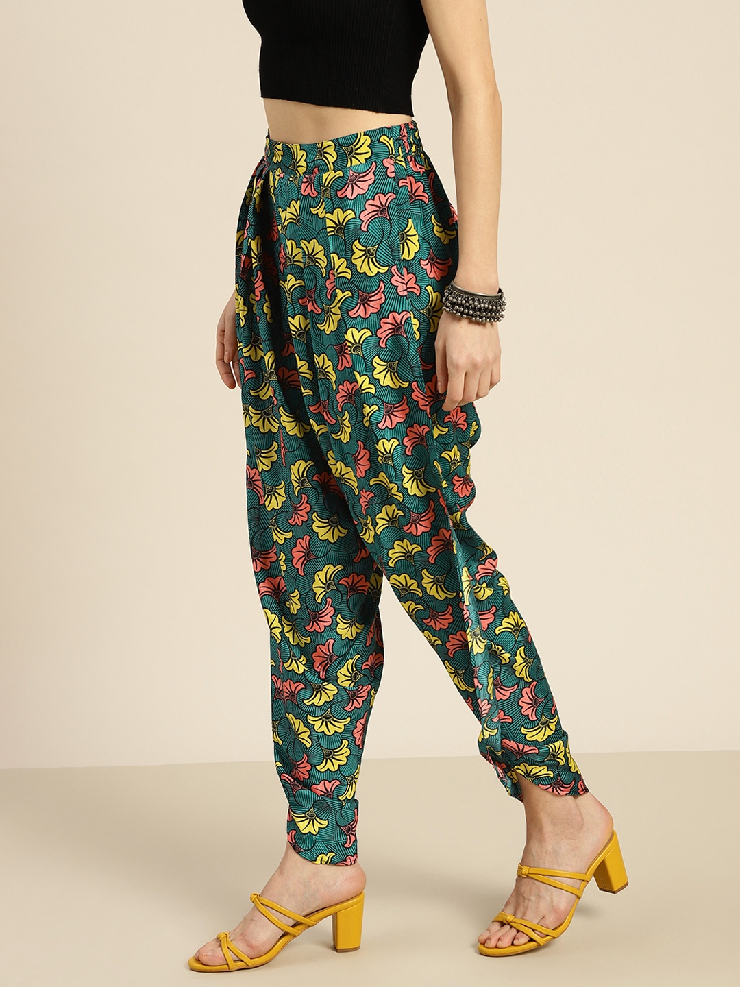 

Shae by SASSAFRAS Women Teal Floral Printed Palazzos