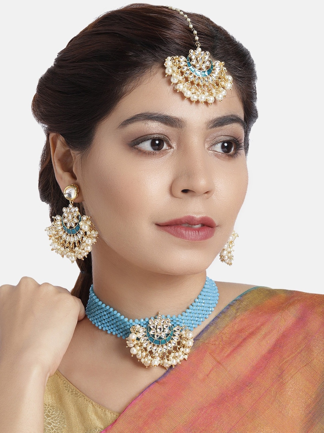 

AccessHer Gold & Brass- Plated Kundan Stone Studded & Beaded Jewellery Set