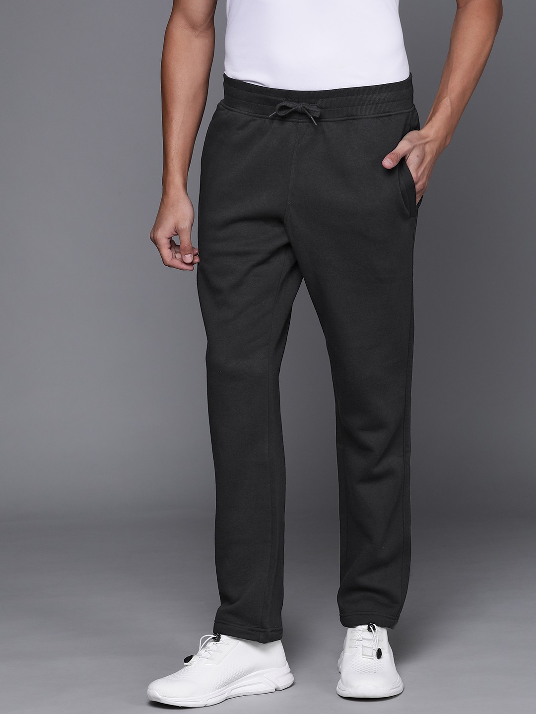 

UNDER ARMOUR Men Black Solid RIVAL FLEECE Track Pants