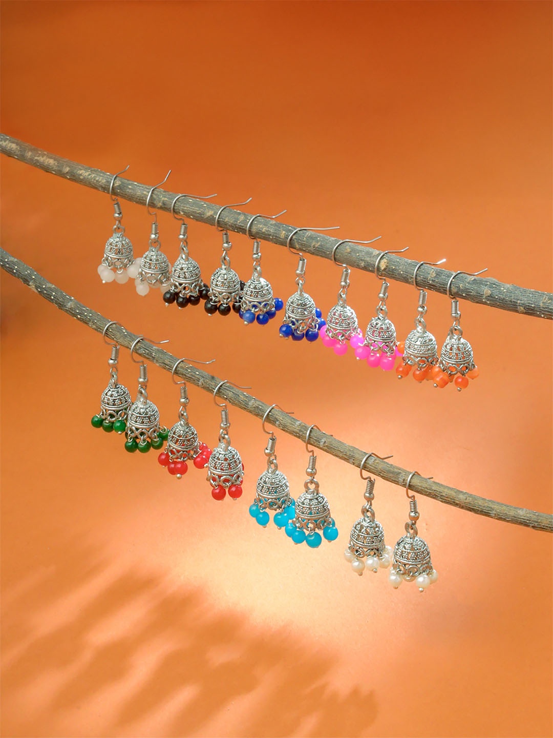 

Yellow Chimes Set of 9 Silver-Toned Dome Shaped Jhumkas Earrings
