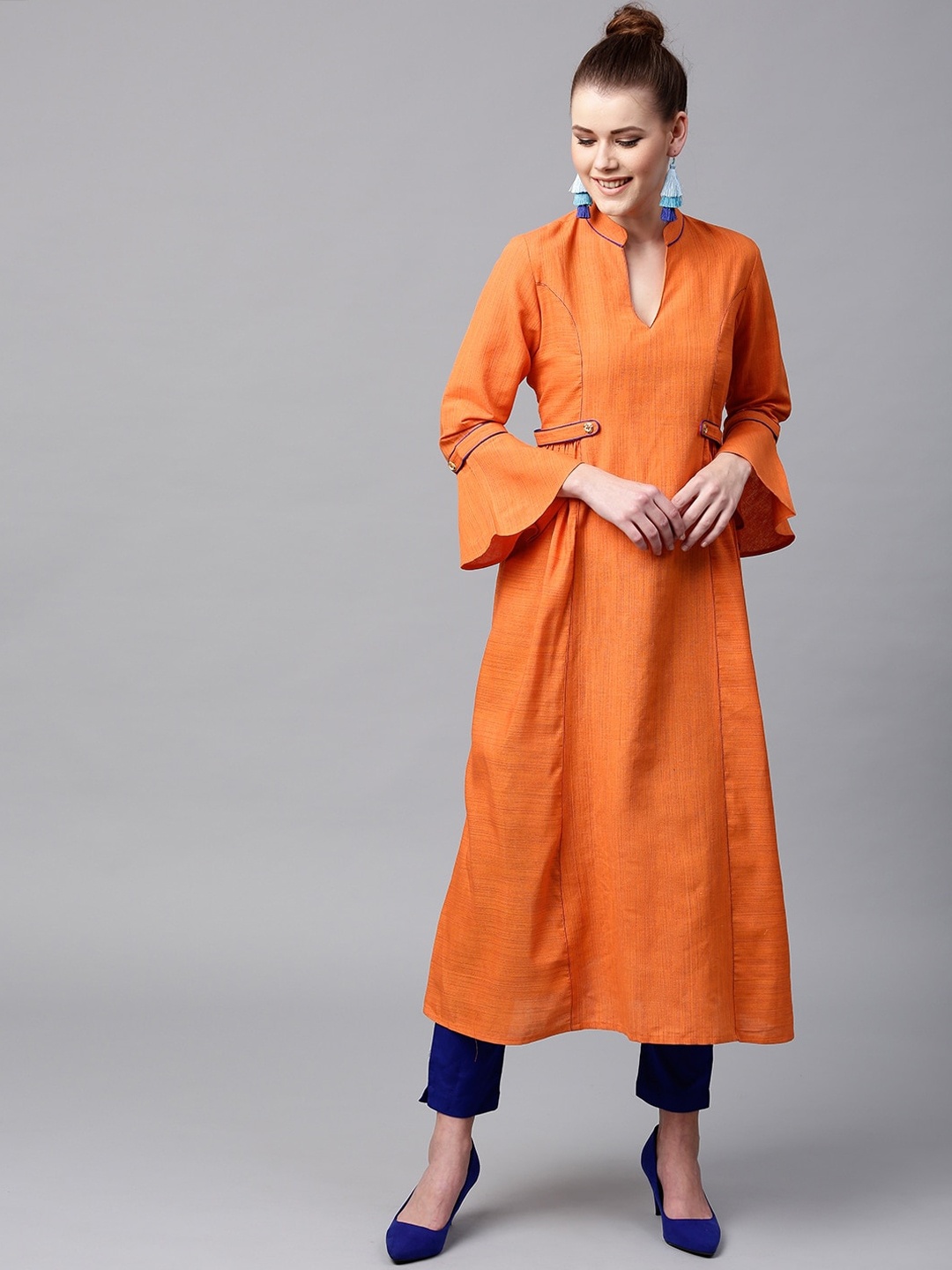 

Tulsattva Women Orange Bell Sleeves Cotton A-Line Kurta