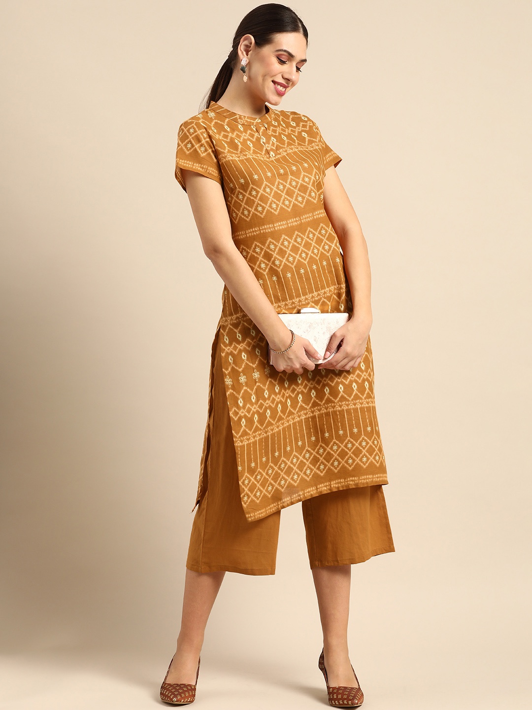 

Anouk Women Mustard Yellow Printed Kurta with Palazzos
