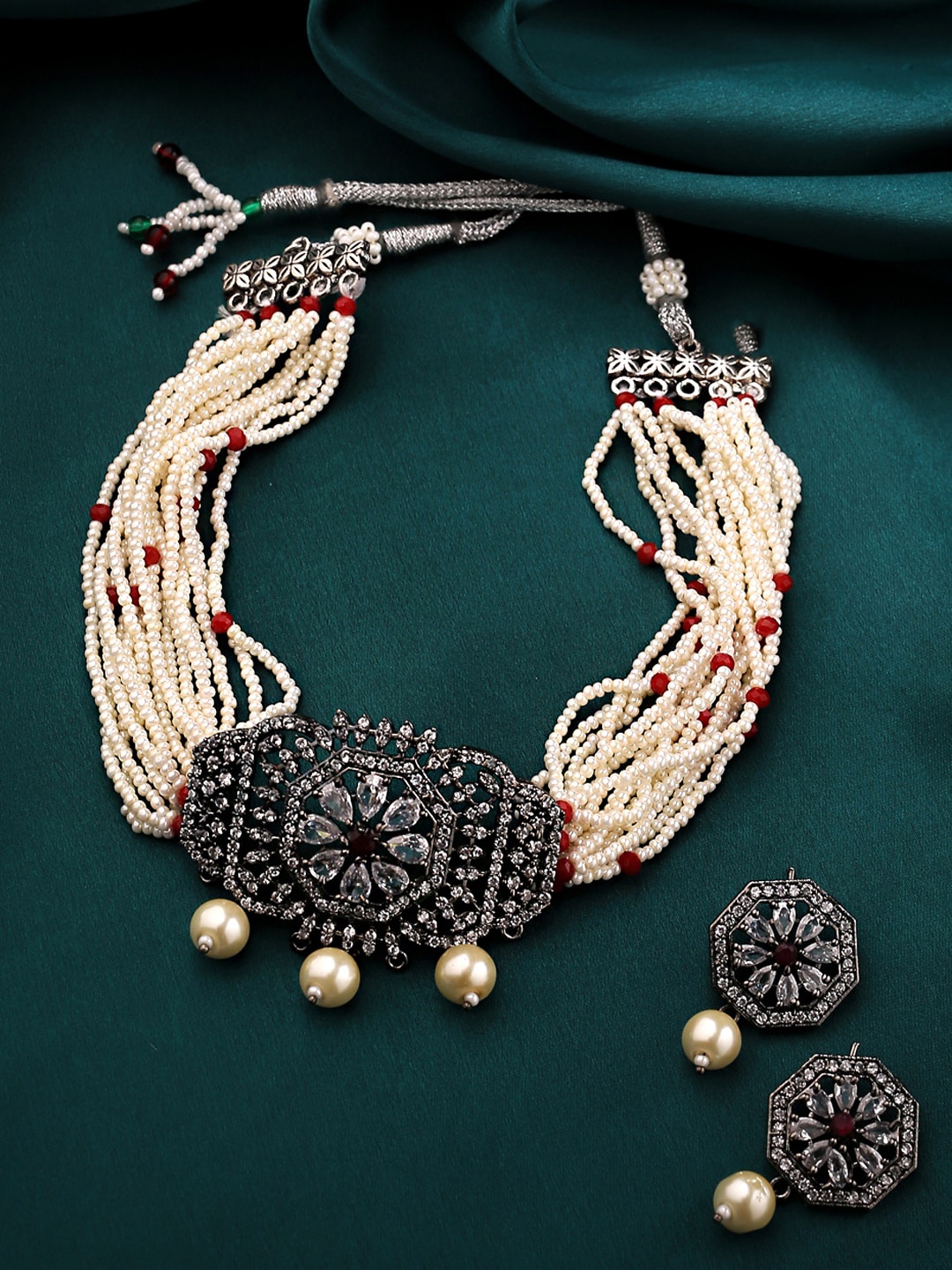 

Yellow Chimes Woman Silver Oxidised Crystal Studded White Beaded Necklace Set
