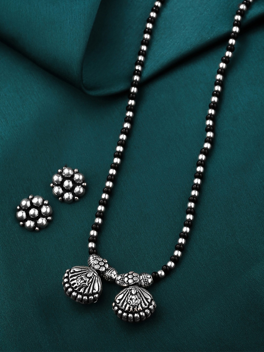 

Yellow Chimes Black Silver-Plated Oxidised Beaded Mangalsutra With Earrings