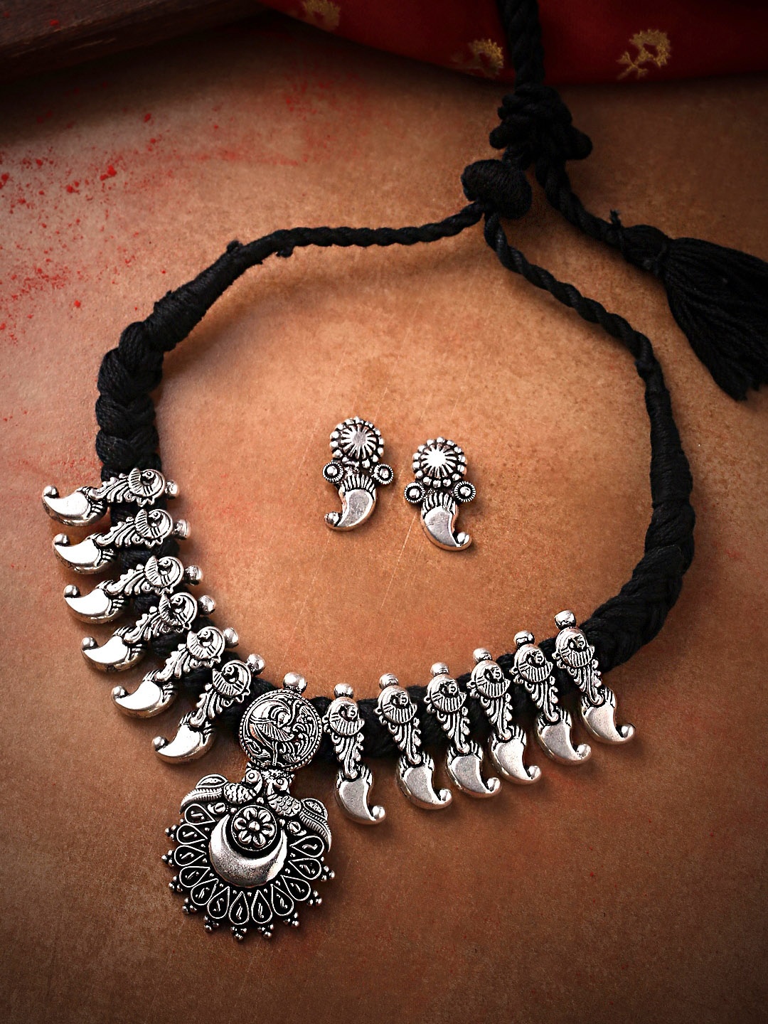 

Yellow Chimes Silver-Plated Kolhapuri Peacock Oxidised Jewellery Set