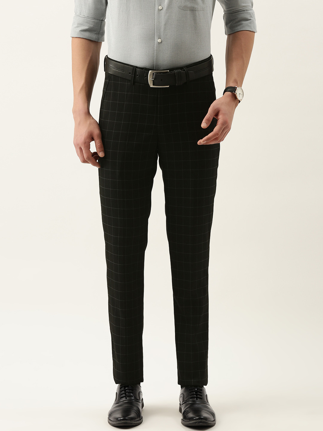 

Peter England Men Black & White Checked Slim Fit Trousers
