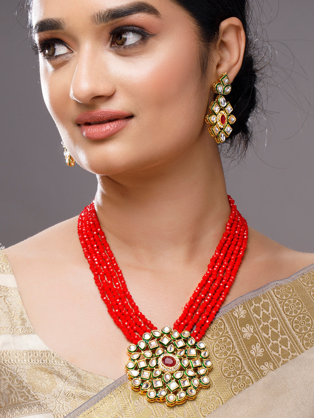 

Anouk Gold-Plated &M Red Studded Layered Jewellery Set