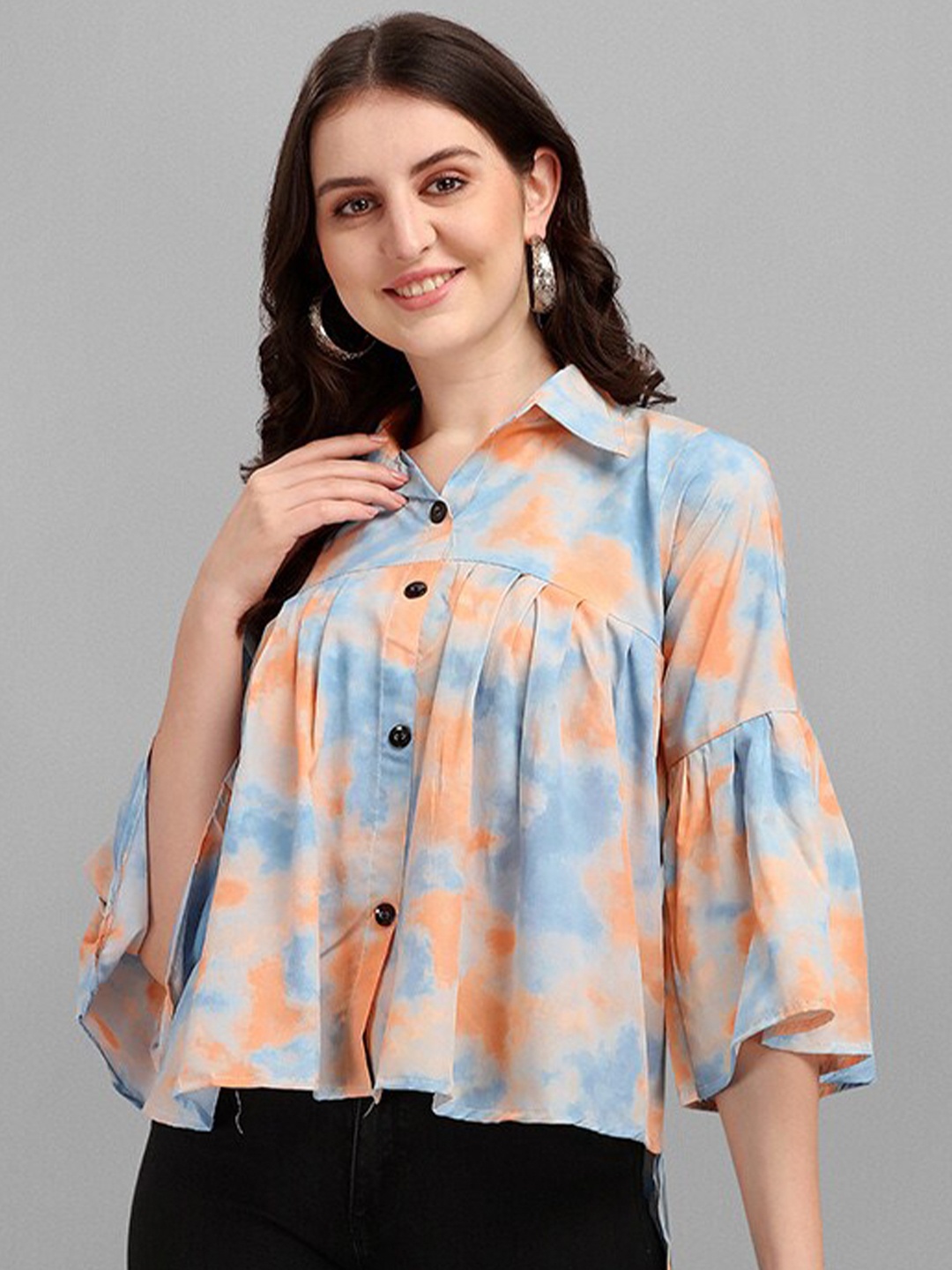 

Amrutam Fab Women Peach-Coloured & Blue Print Crepe Shirt Style Top