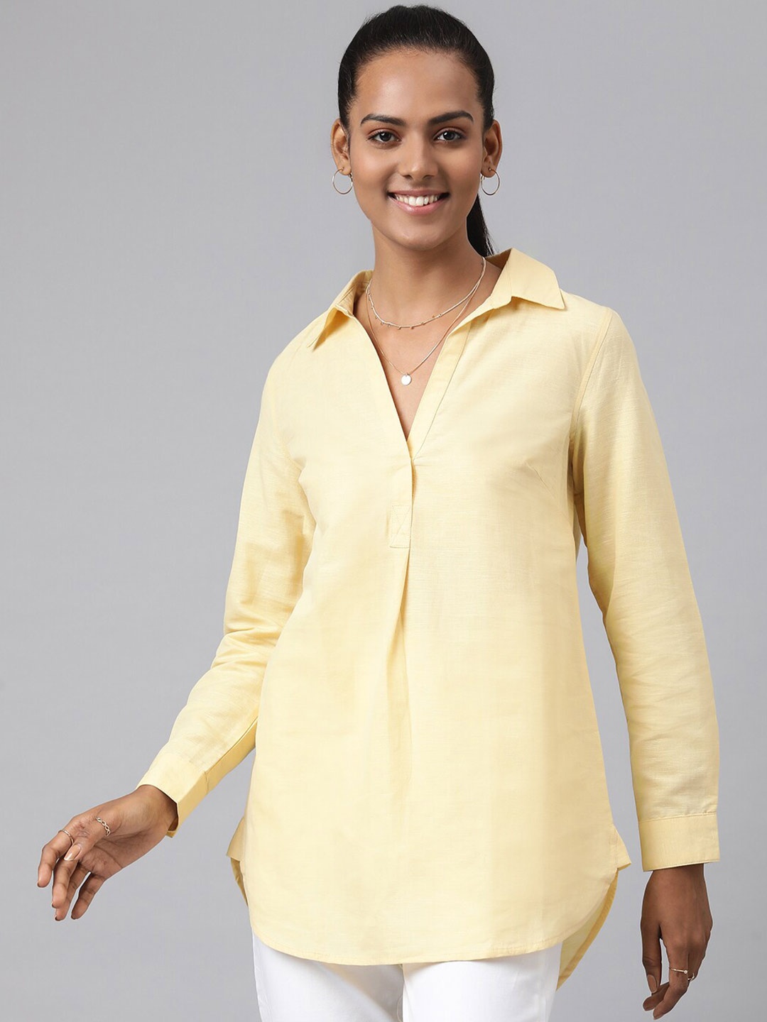 

Fabindia Women Mustard Solid Linen Tunics