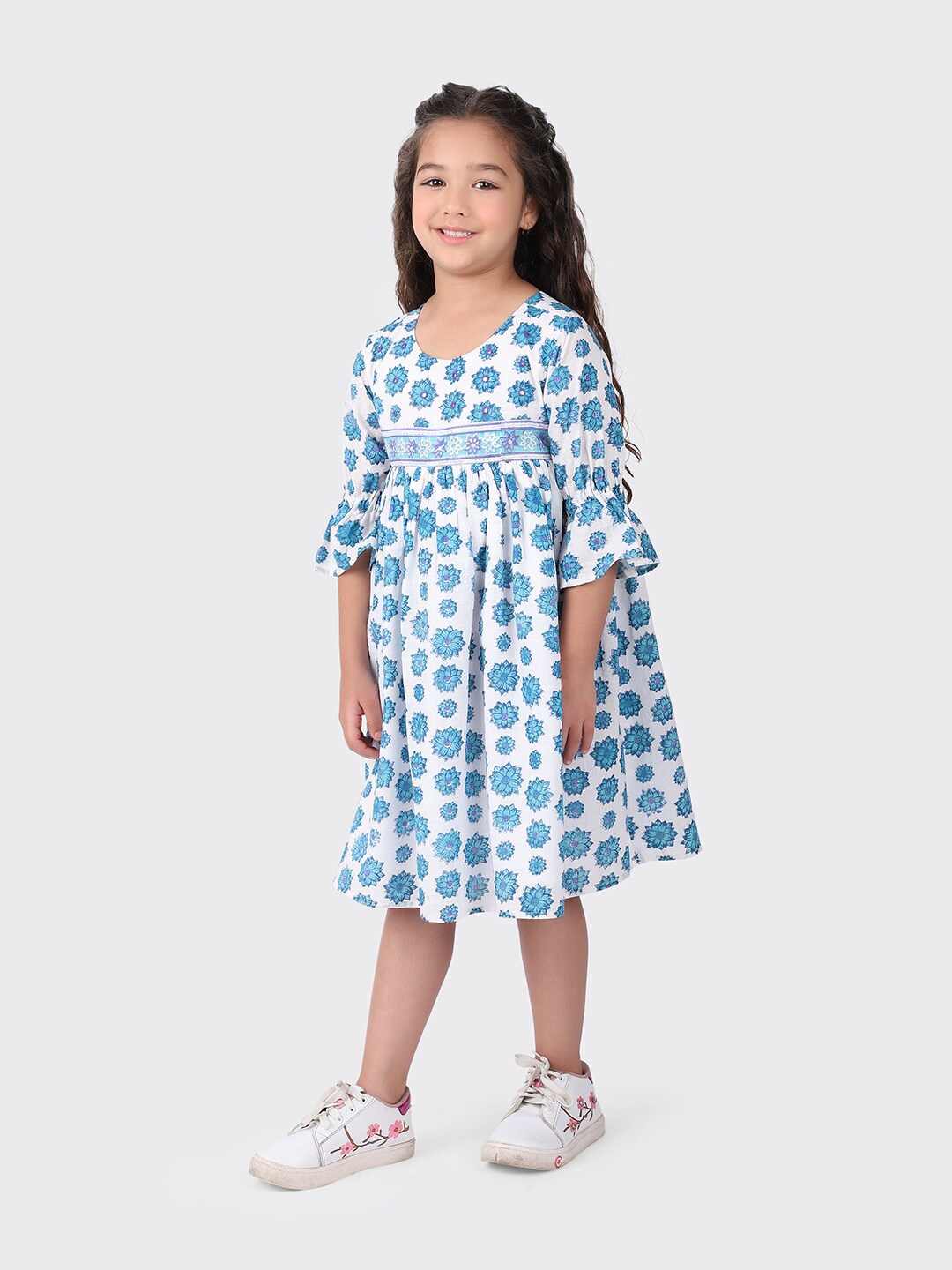 

Fabindia Girls White & Blue Bell Sleeves Floral Cotton Empire Dress