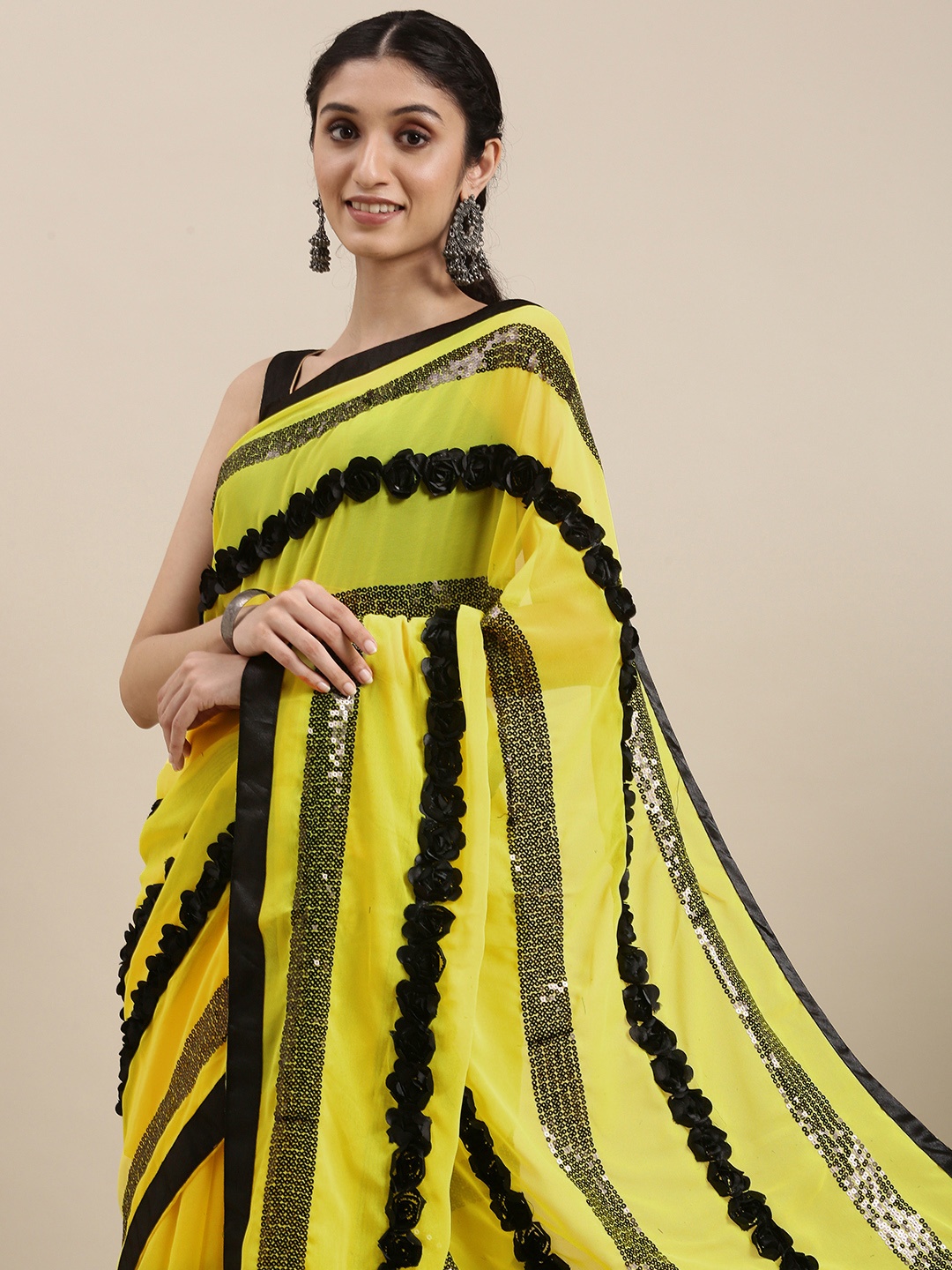 

VASTRANAND Yellow & Black Striped Sequinned Floral Applique Saree