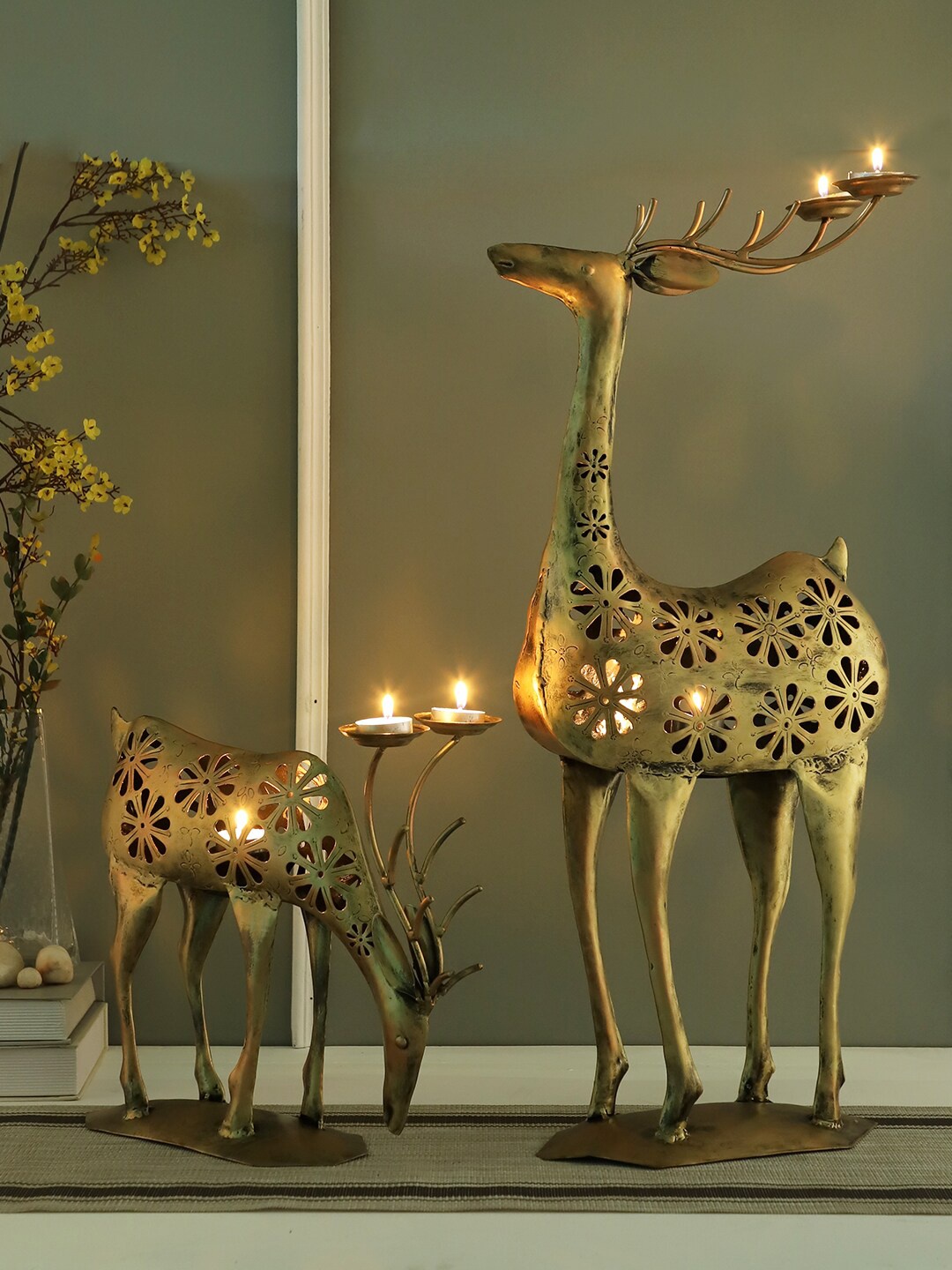 

Aapno Rajasthan Set Of 2 Gold-Toned Deer Shaped Candle Holders
