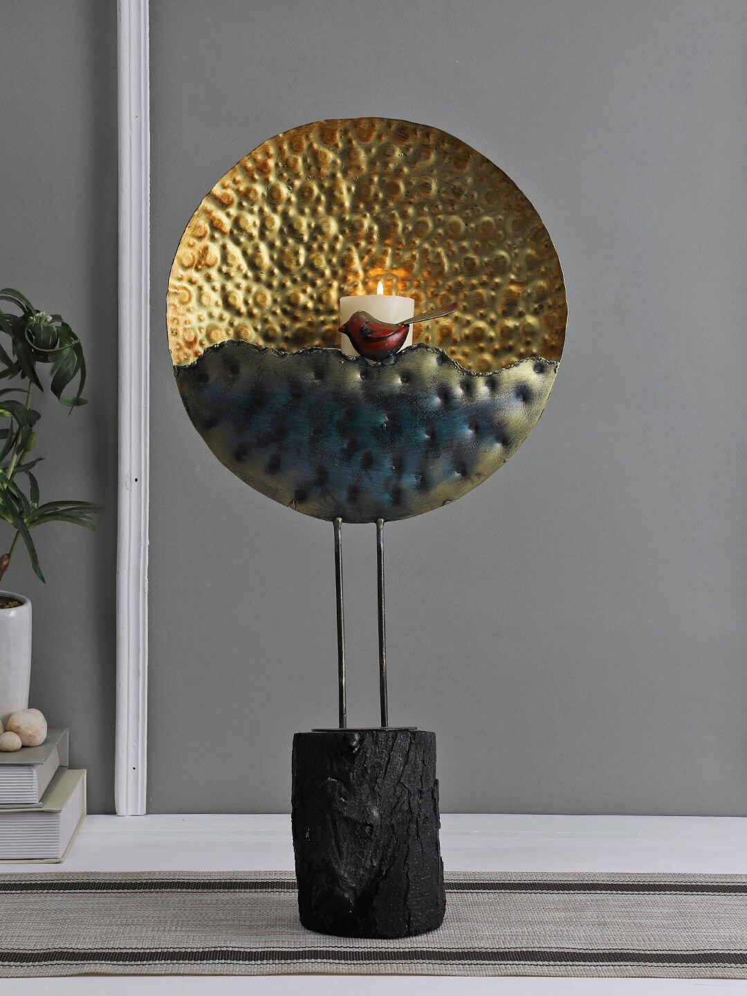 

Aapno Rajasthan Gold-Toned Candle Holder
