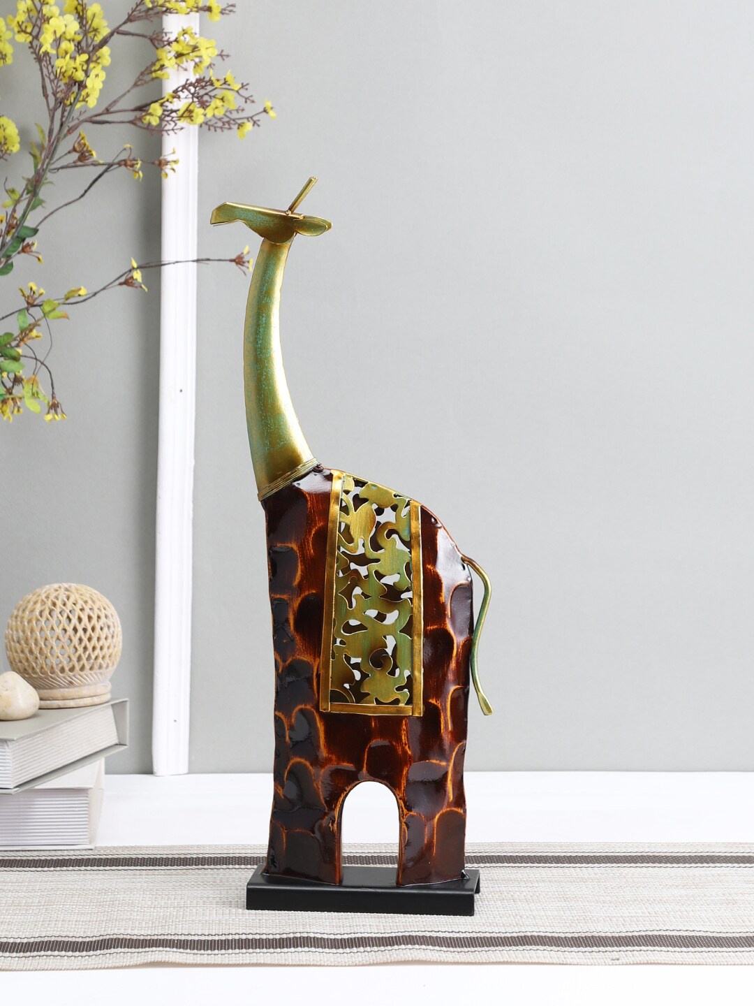 

Aapno Rajasthan Brown & Gold-Toned Giraffe Showpiece