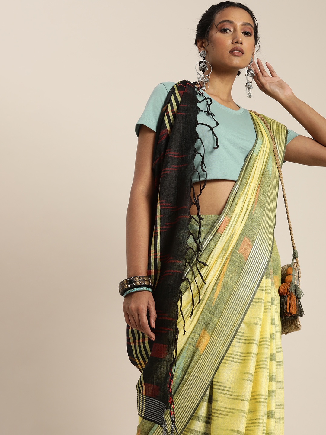 

Taavi Yellow & Green Woven Design Ikat Saree