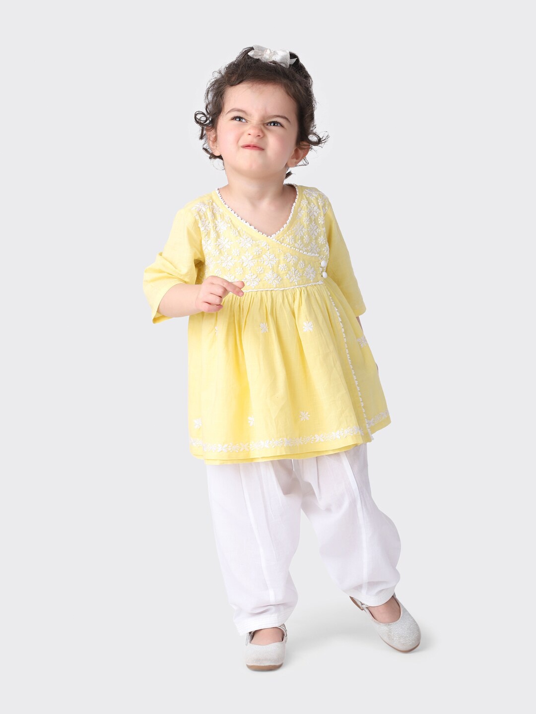 

Fabindia Girls Yellow & White Embroidered Pure Cotton Kurta with Dhoti Pant Set