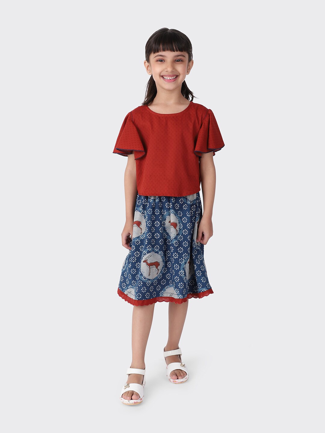 

Fabindia Girls Blue & Red Printed Cotton Top with Skirt Clothing set