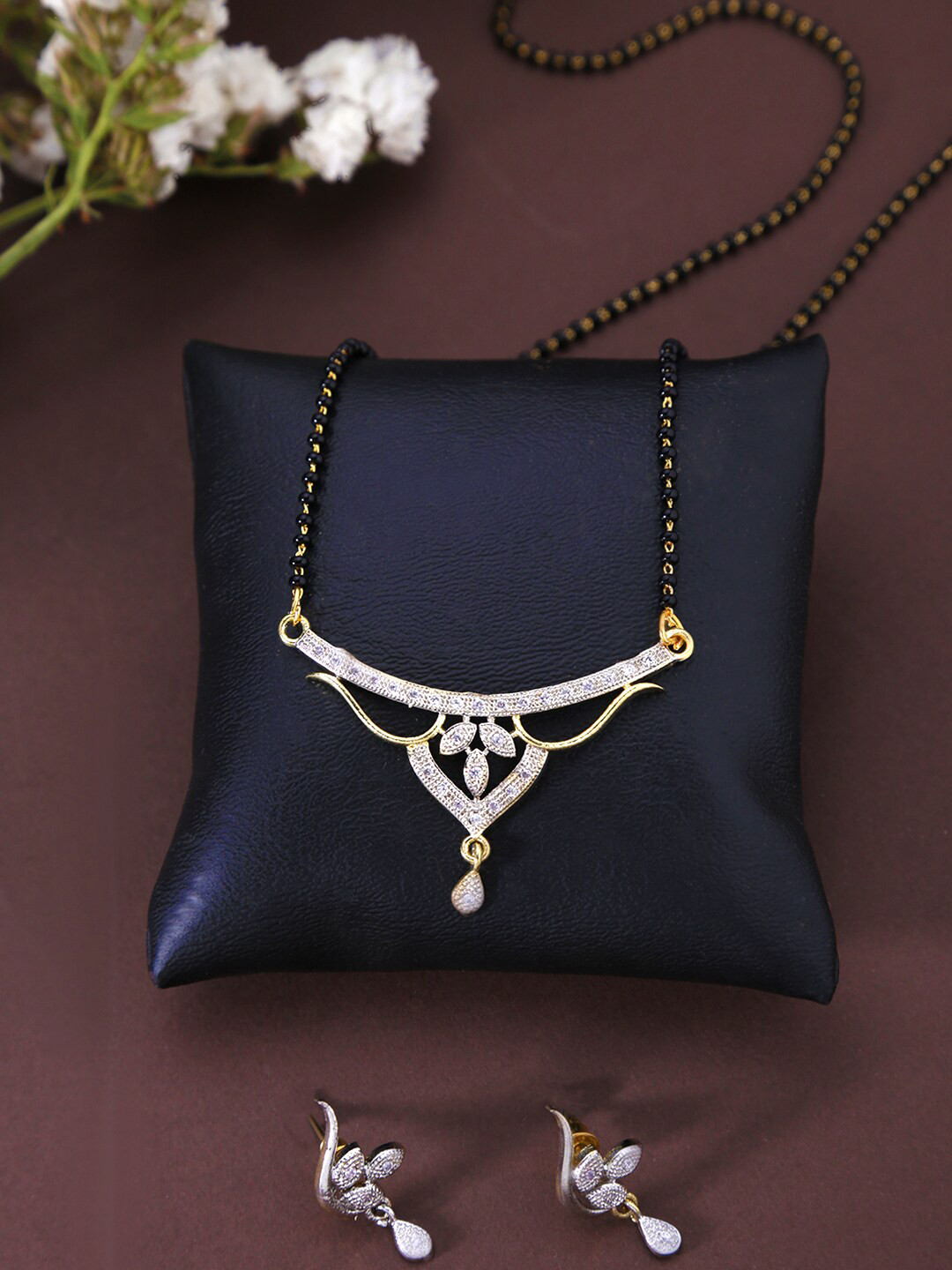 

Yellow Chimes Gold-Plated & White Stone-Studded & Beaded Mangalsutra Set