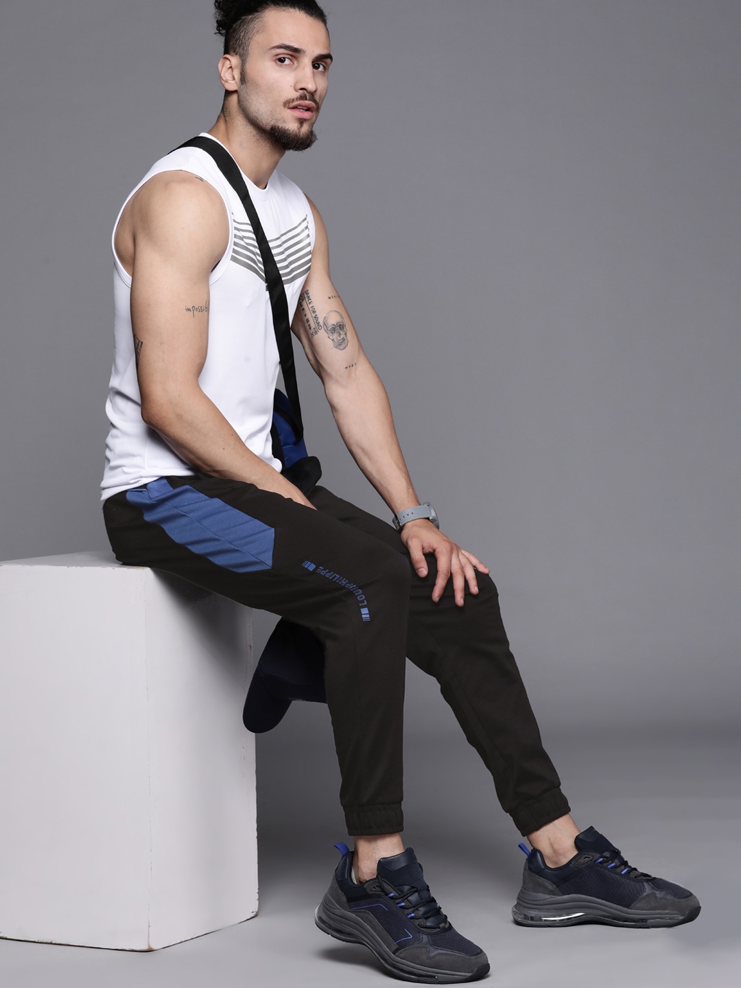 

Louis Philippe ATHPLAY Men Black & Blue Solid Joggers