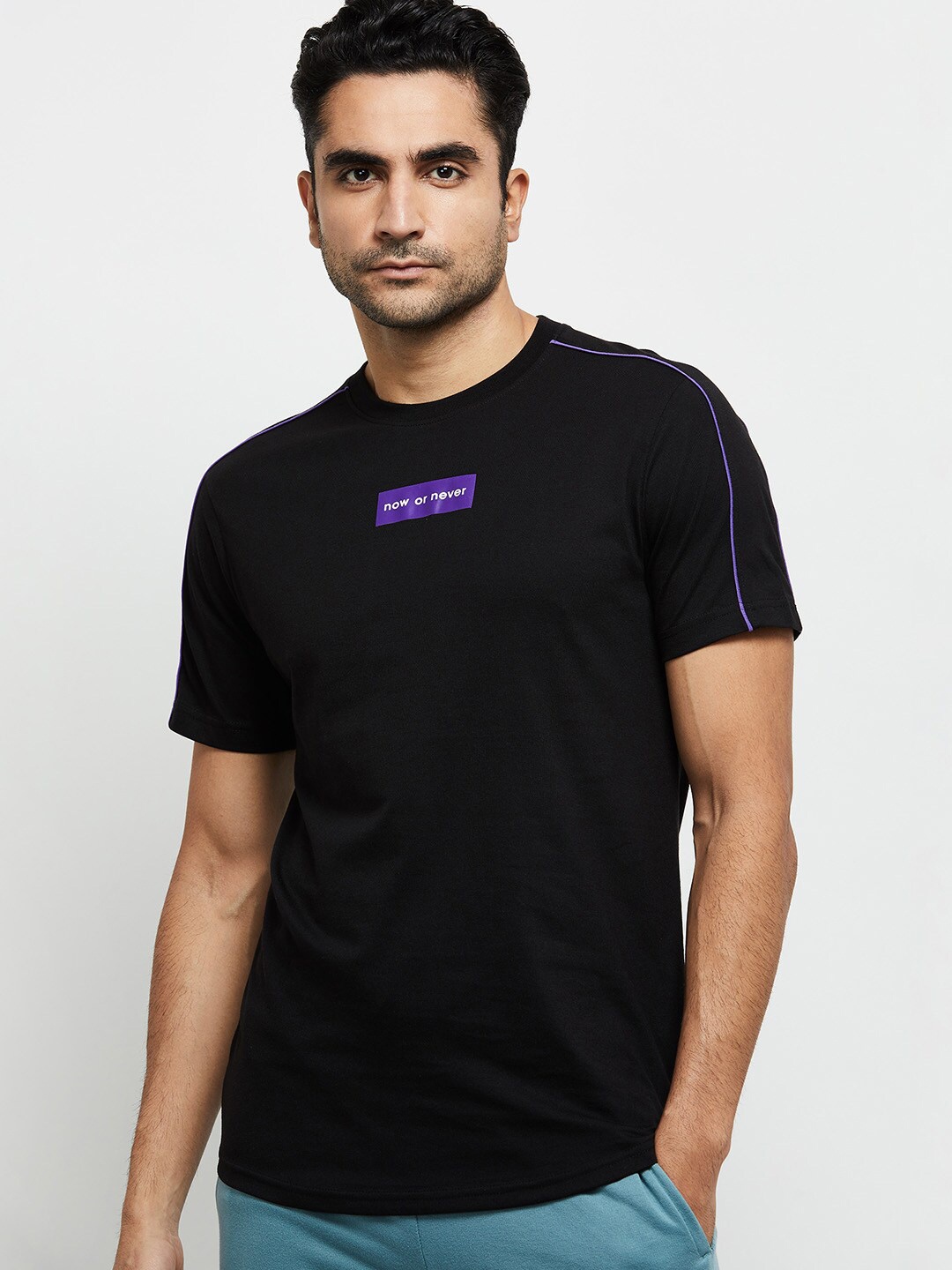 

max Men Black Typography T-shirt