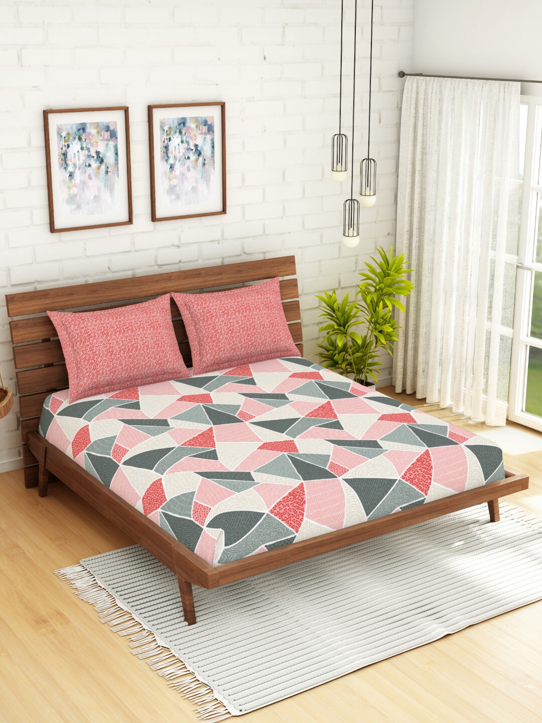 

SPACES Peach & Cream Geometric Printed 144 TC Cotton Queen Bedsheet with 2 Pillow Covers
