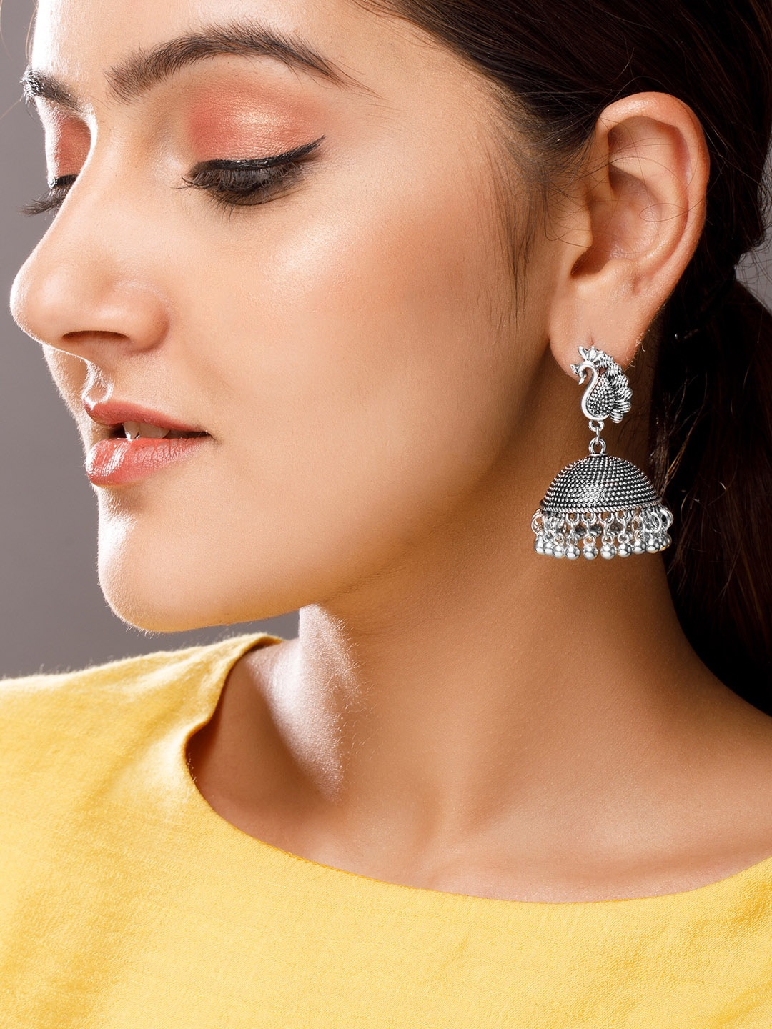 

Rubans Silver-Toned Dome Shaped Jhumkas Earrings