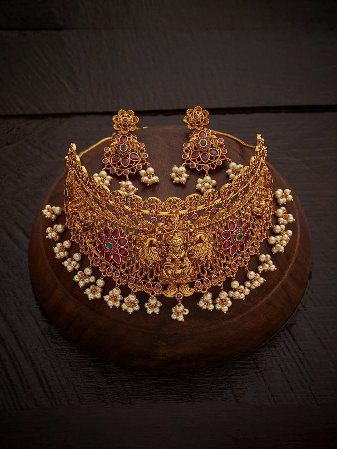 

Kushal's Fashion Jewellery Women Gold-Toned & Red Stone Temple Choker Jewellery Set