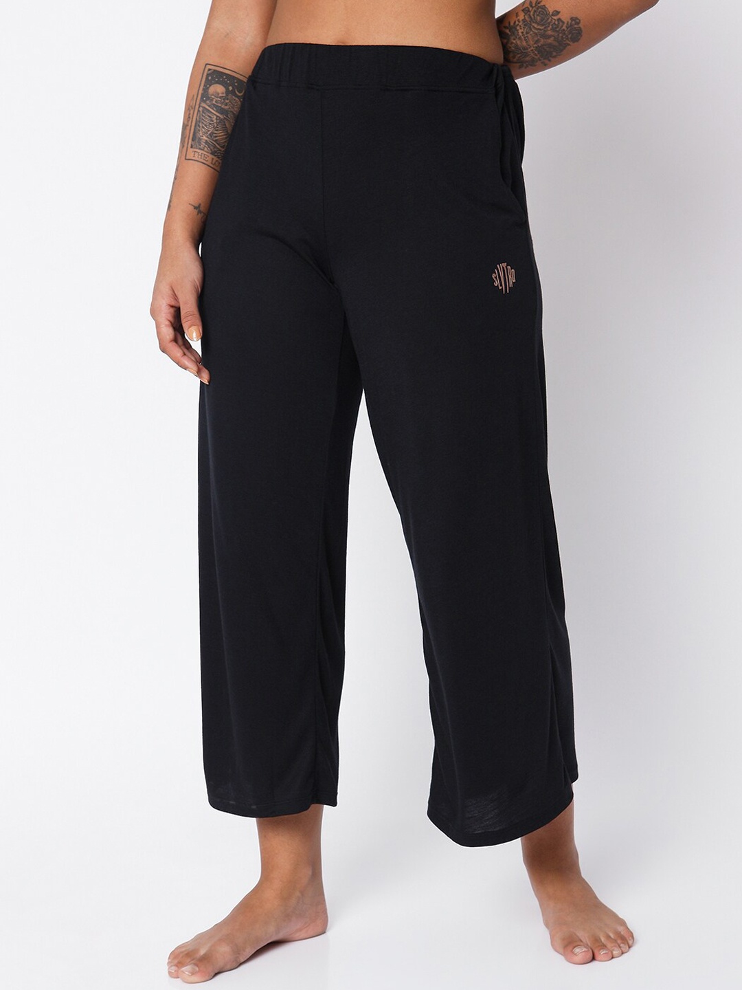 

Silvertraq Women Black Solid Flared Lounge Pants