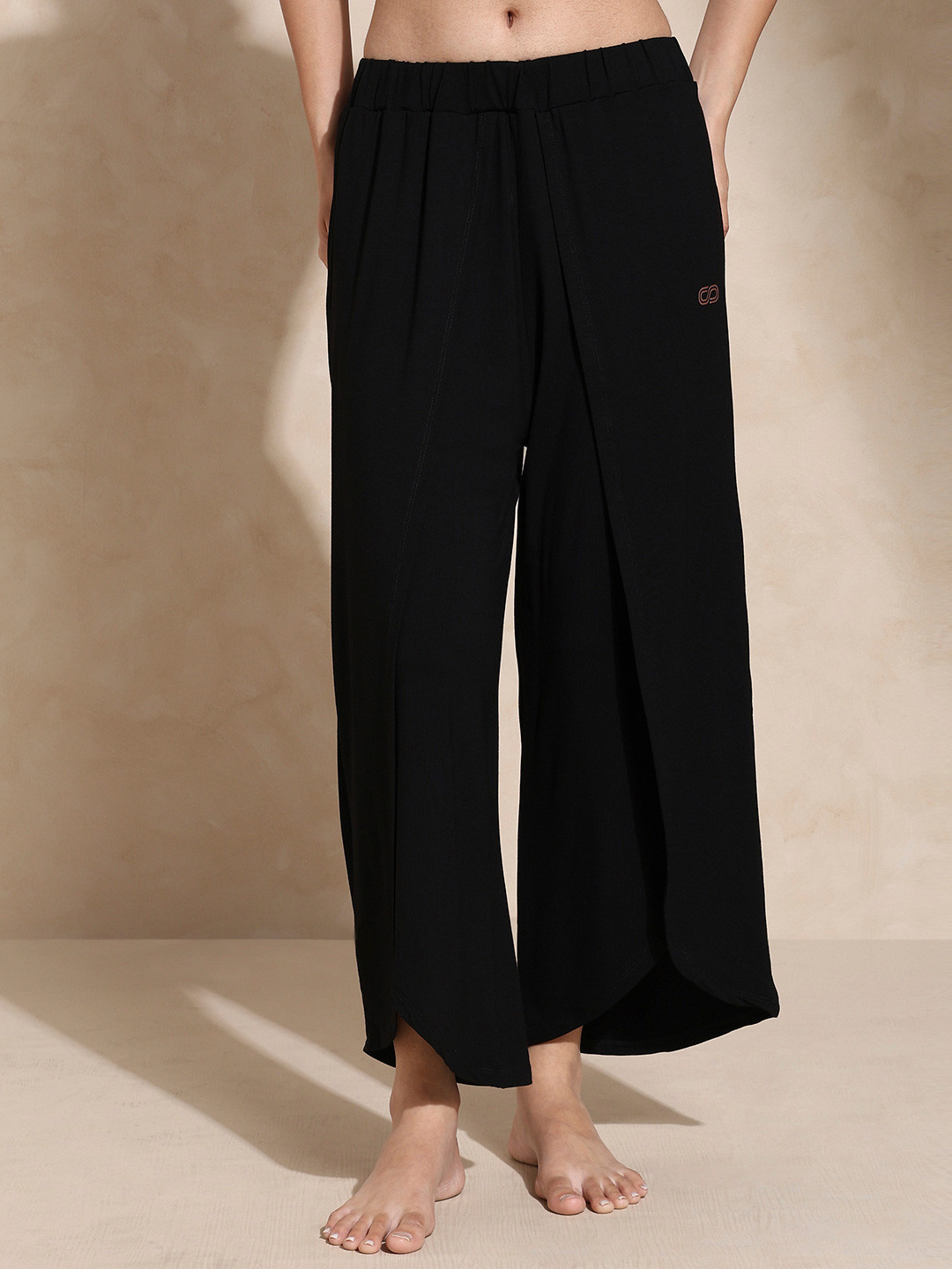 

Silvertraq Women Black Solid Three-Fourth Length Yoga Tulip Track Pants