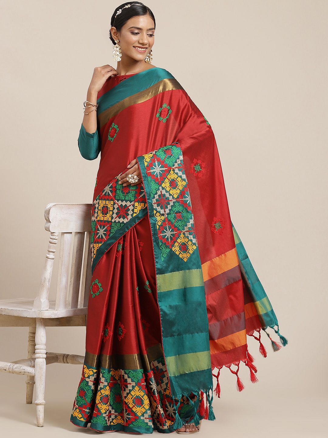 

Mitera Red & Teal Ethnic Motifs Zari Silk Cotton Saree