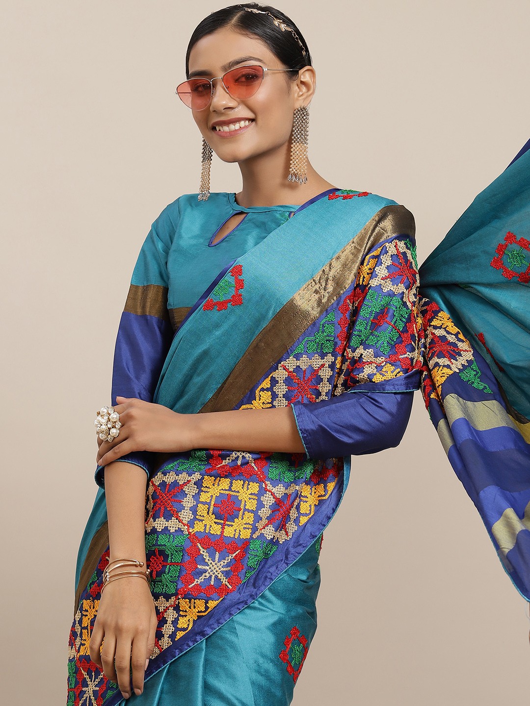 

Mitera Women Blue Embellished Kutchi Embroidery Silk Cotton Saree