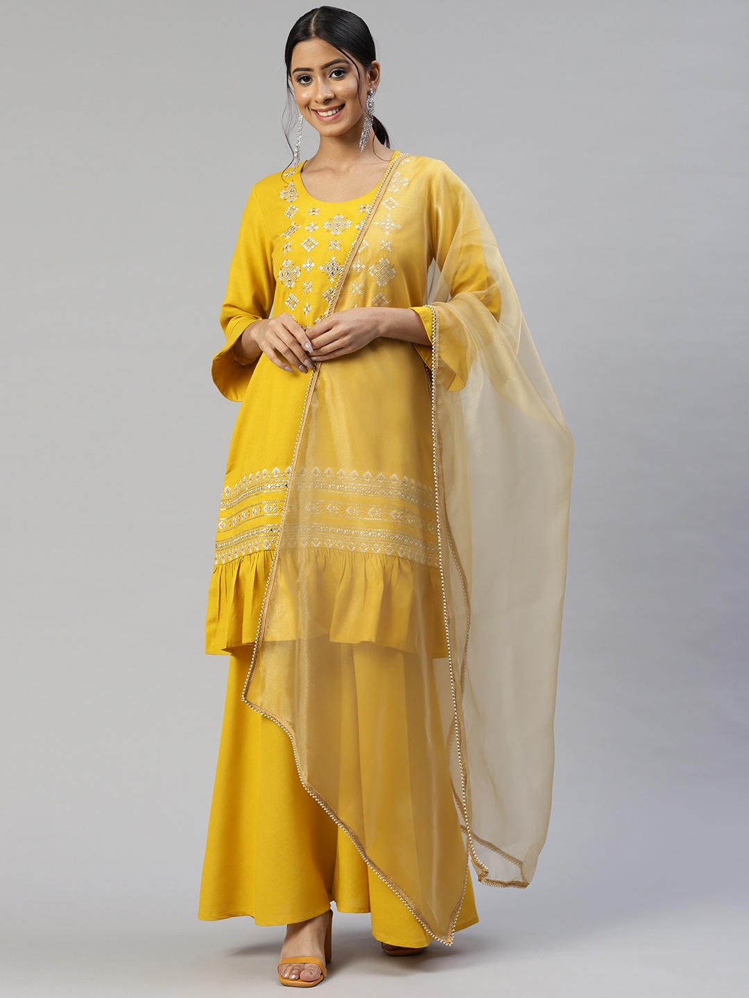 

Cottinfab Women Mustard Yellow Ethnic Motifs Embroidered Patchwork Kurta with Sharara & With Dupatta