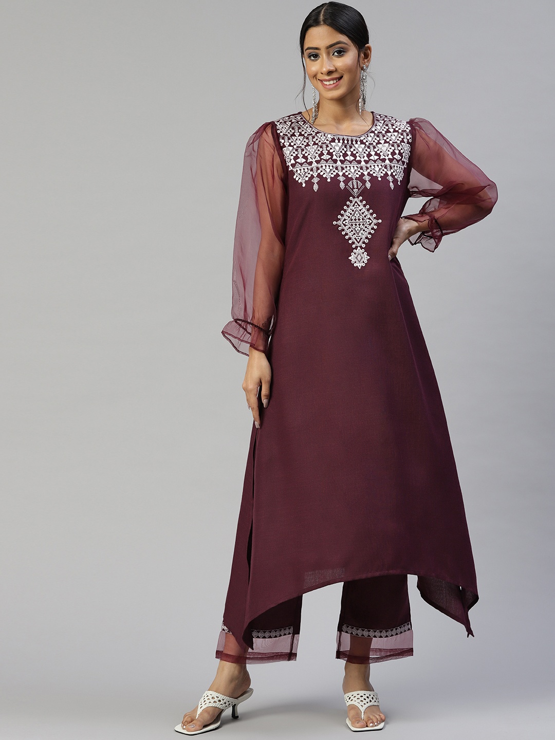 

Cottinfab Women Burgundy Ethnic Motifs Embroidered Kurta with Palazzos