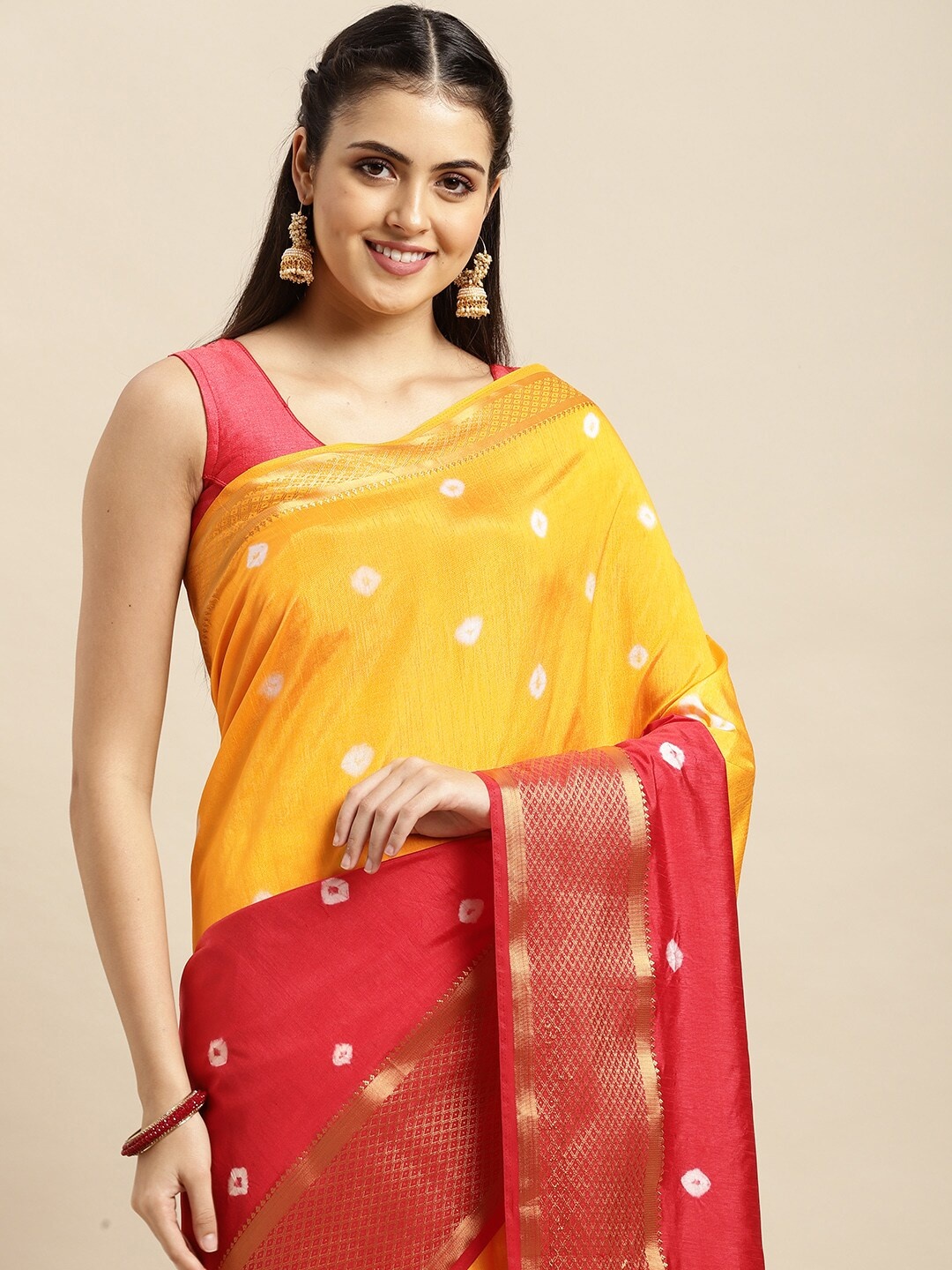 

VAIRAGEE Yellow & Red Tie and Dye Printed Saree