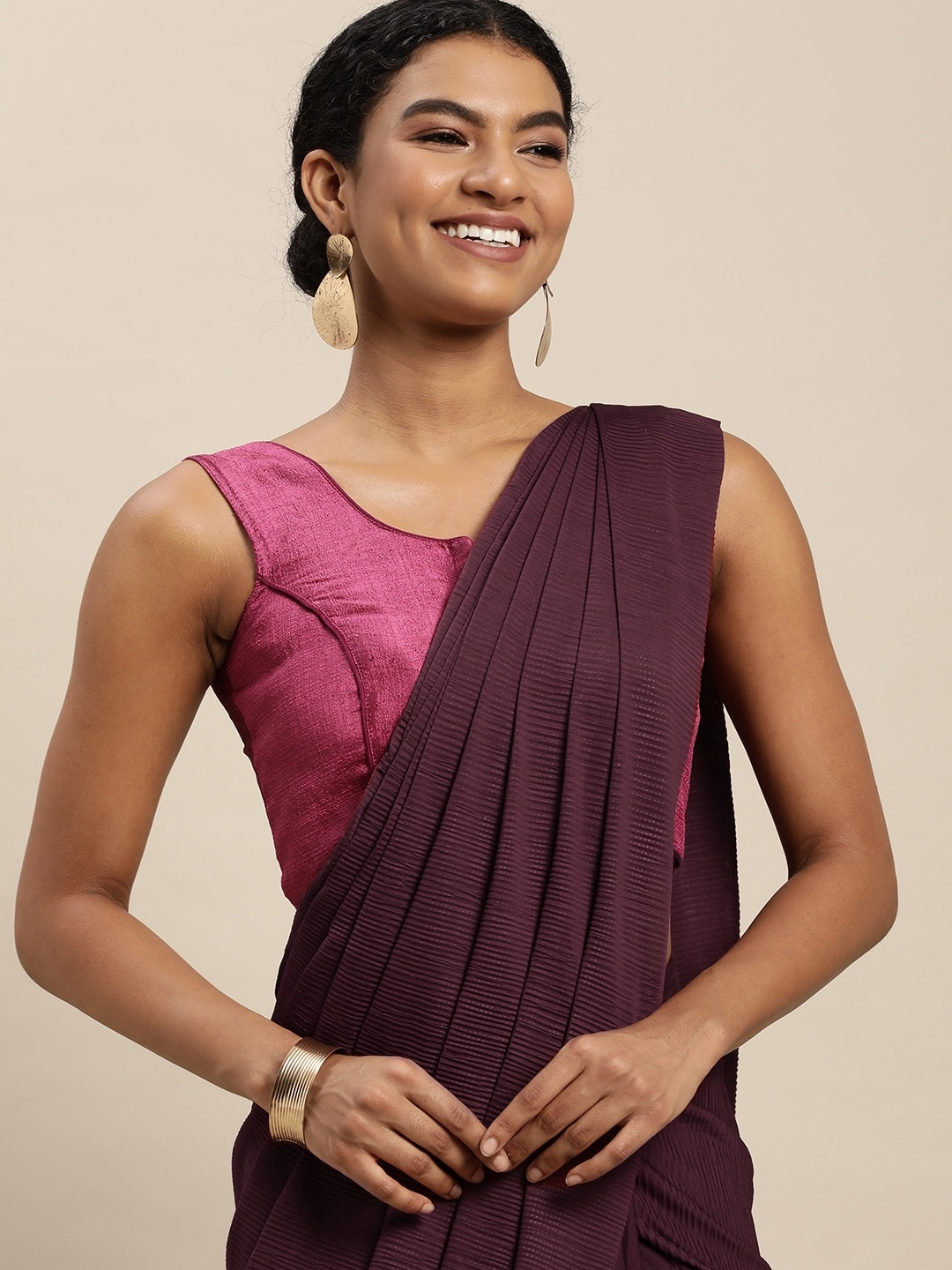 

VAIRAGEE Maroon Self-Striped Voile Saree