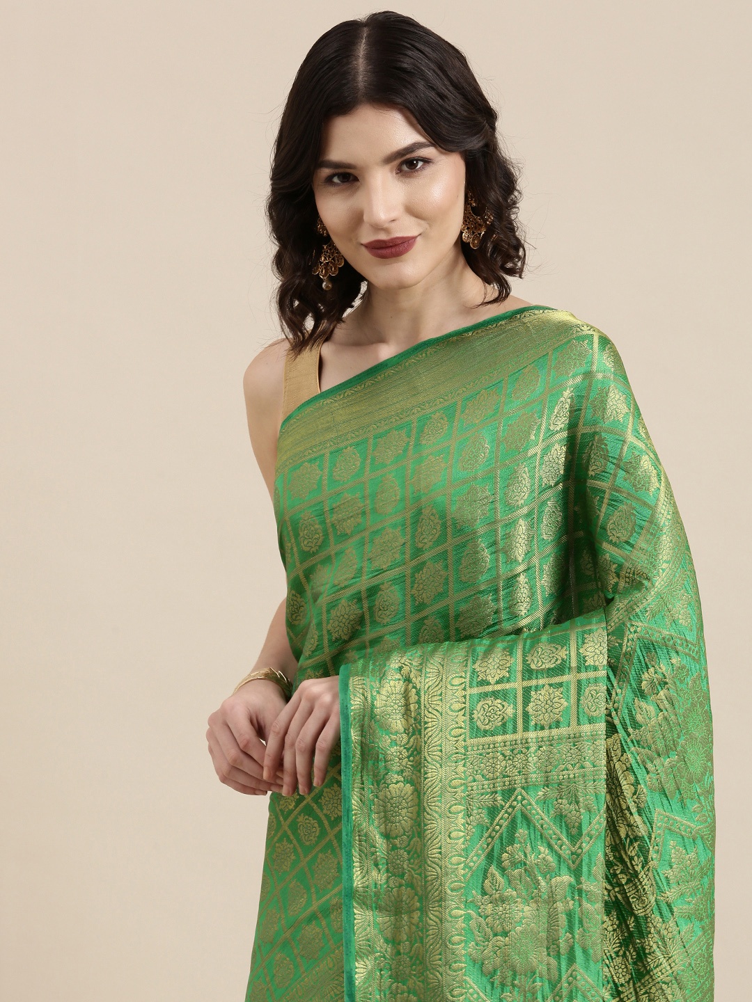 

VAIRAGEE Green & Golden Ethnic Motifs Pure Silk Kanjeevaram Saree