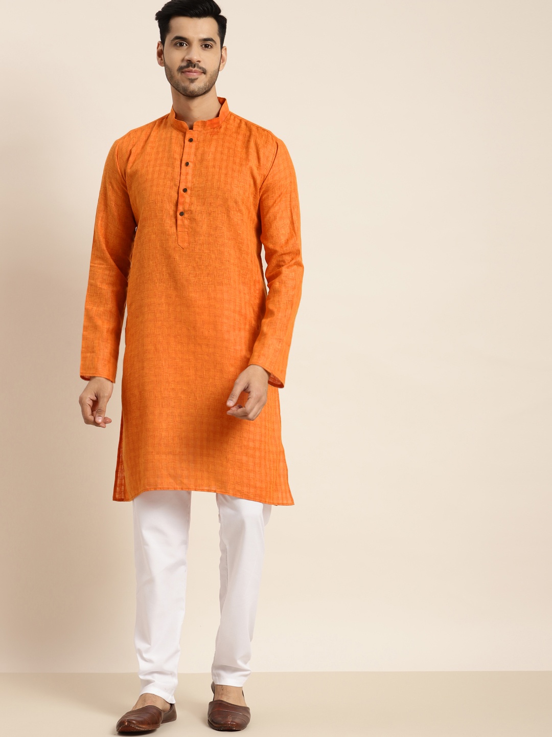 

Anug by SOJANYA Men Orange Kurta with Churidar