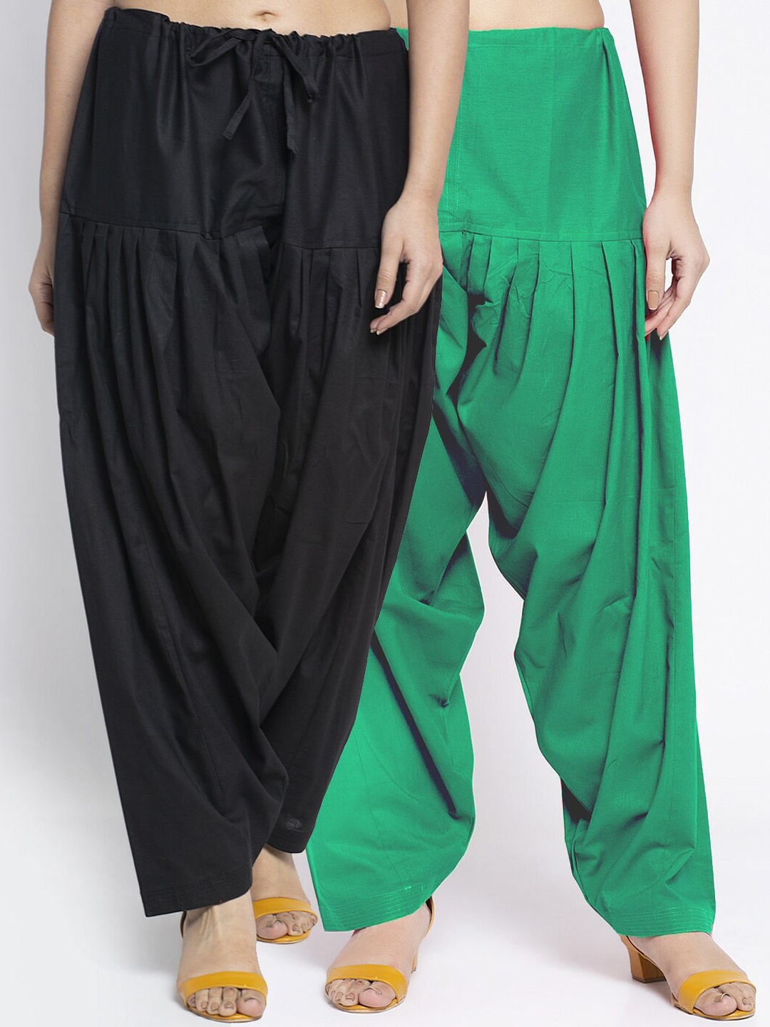 

Jinfo Women Pack of 2 Black & Green Solid Loose Fit Cotton Salwar