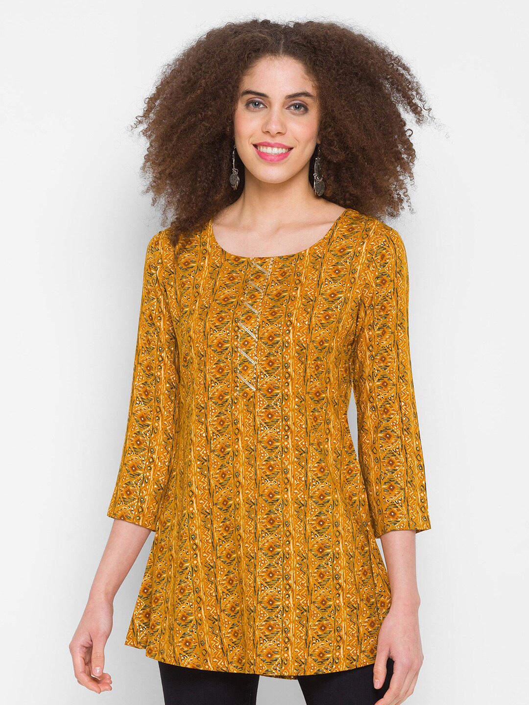 

TANKHI Women Yellow & Brown Scoop Neck Printed Rayon Tunic