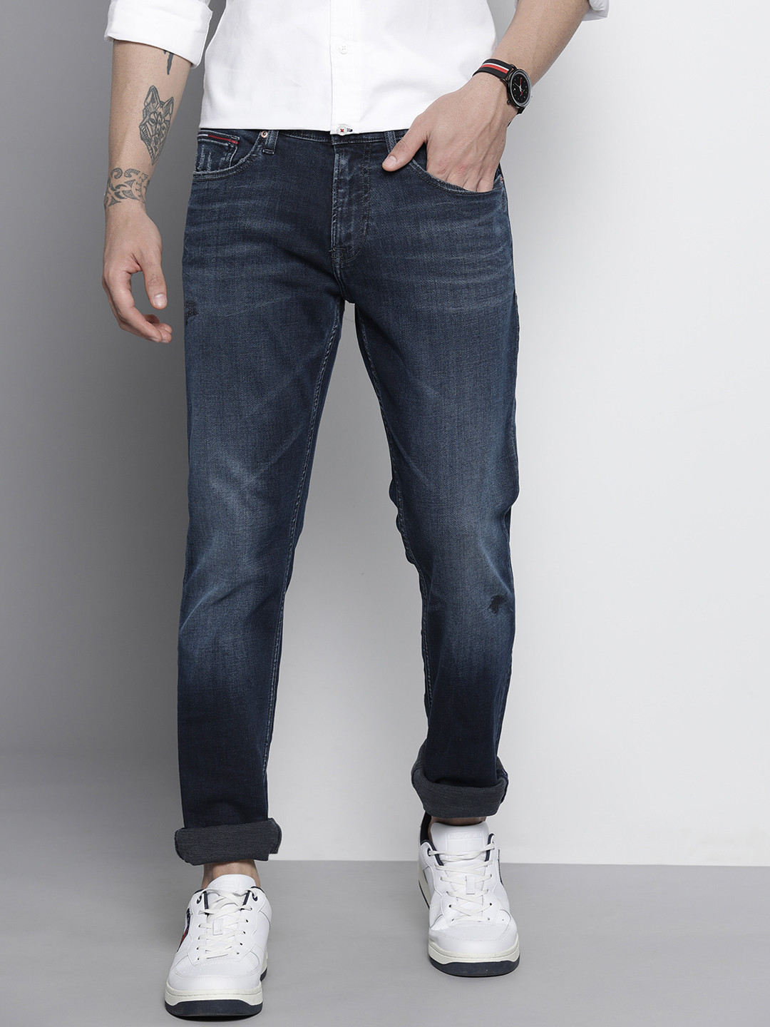

Tommy Hilfiger Men Blue Slim Fit Mid-Rise Light Fade Jeans