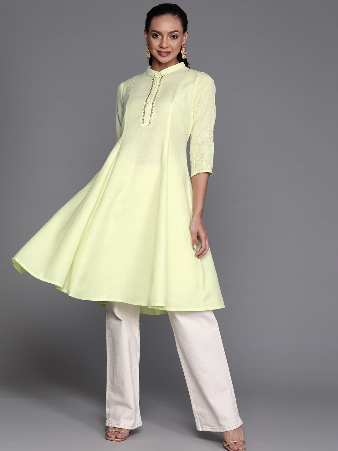 

Indo Era Women Yellow Pure Cotton Solid Thread Work A-Line Kurta