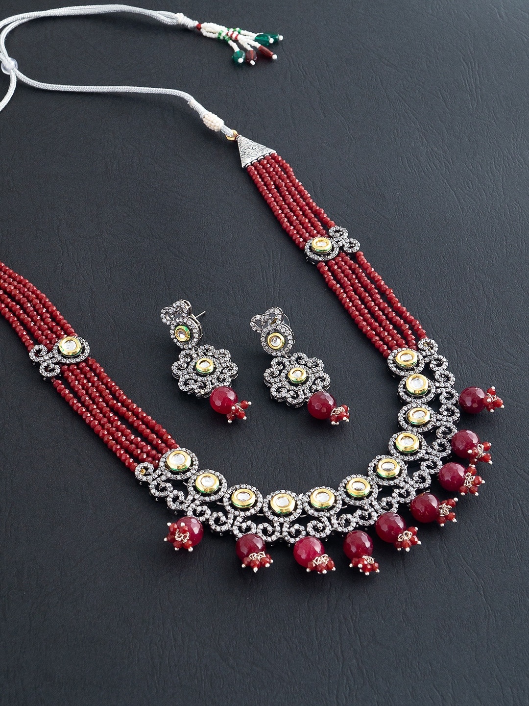 

Golden Peacock Maroon & Silver-Toned Stone-Studded & Pearls Jewellery Set