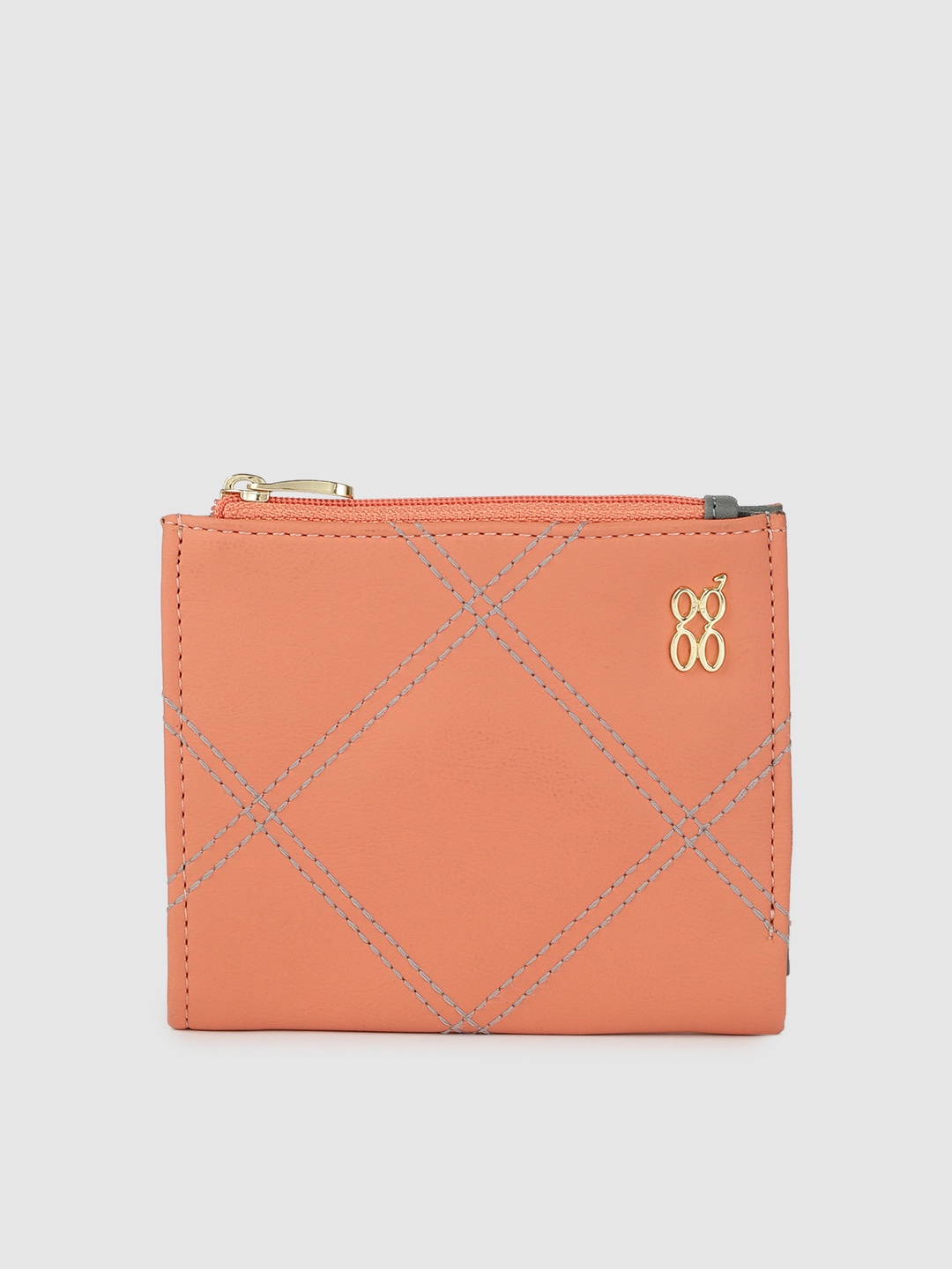 

Baggit Women Peach Orange Solid Quilted Two Fold Wallet
